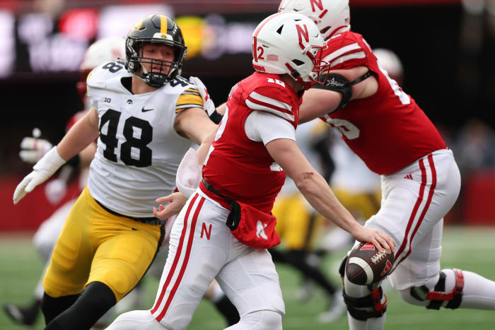NU vs. Iowa 2023 - Max Llewellyn chases Chubba Purdy